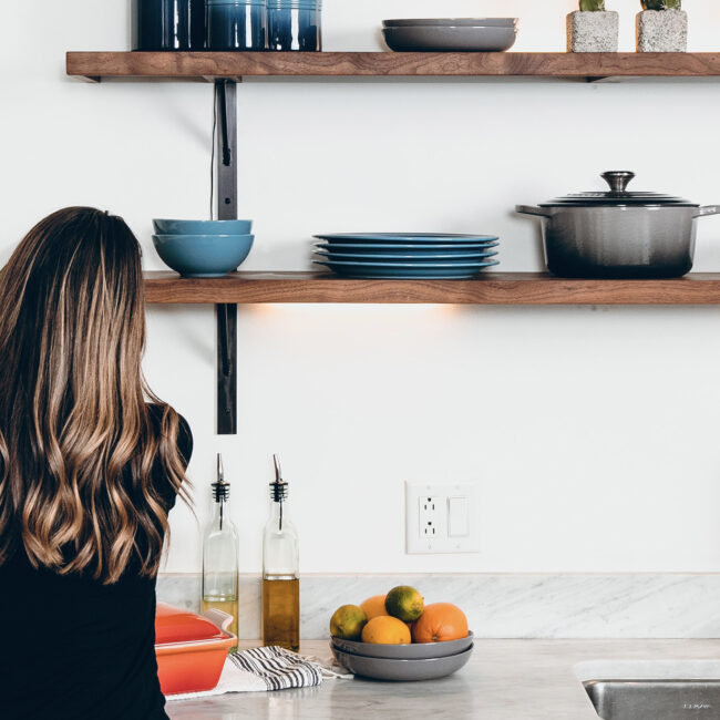 Woman baking in a beautiful clean kitchen